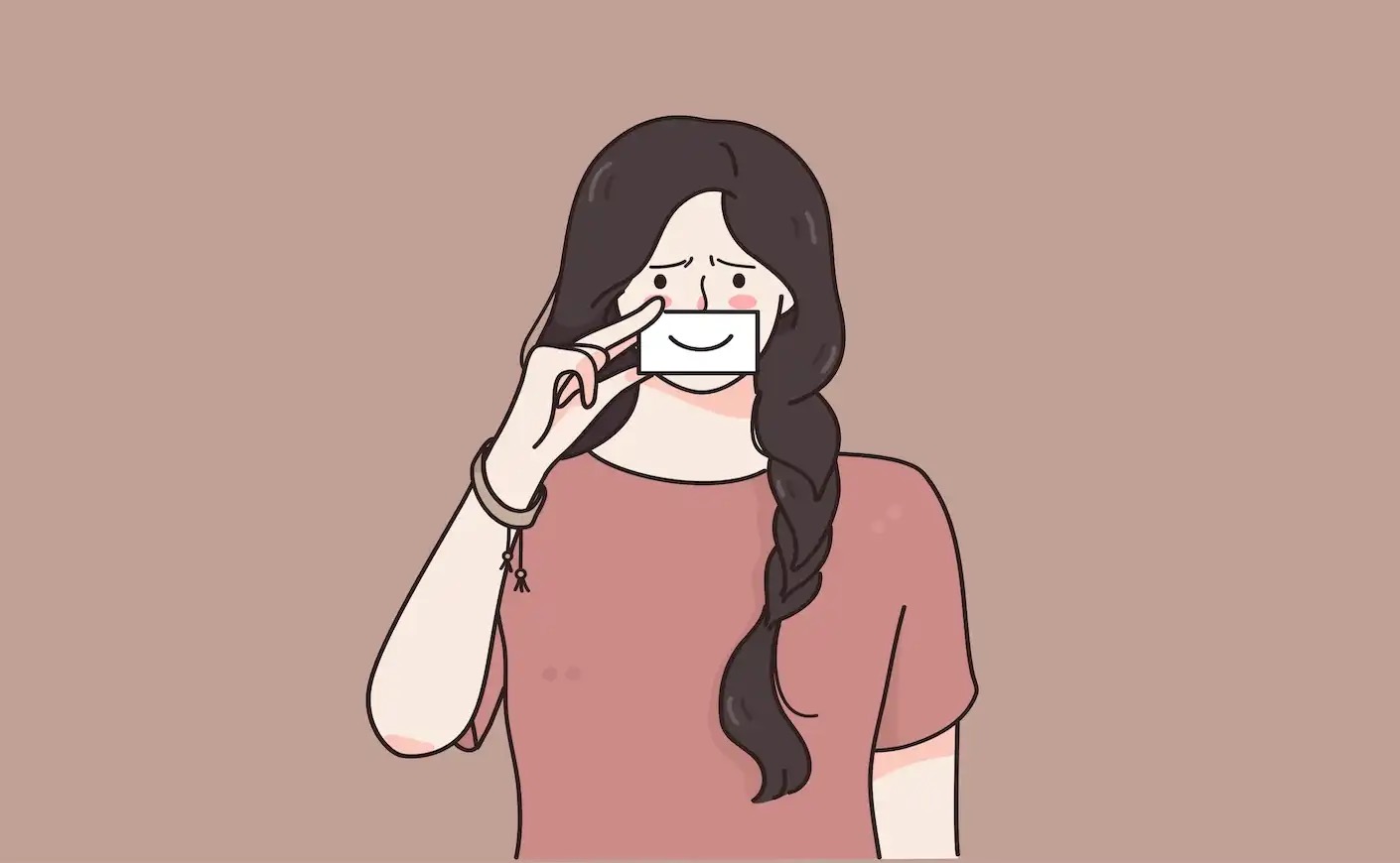 girl holding paper with smiley drawn on it over mouth